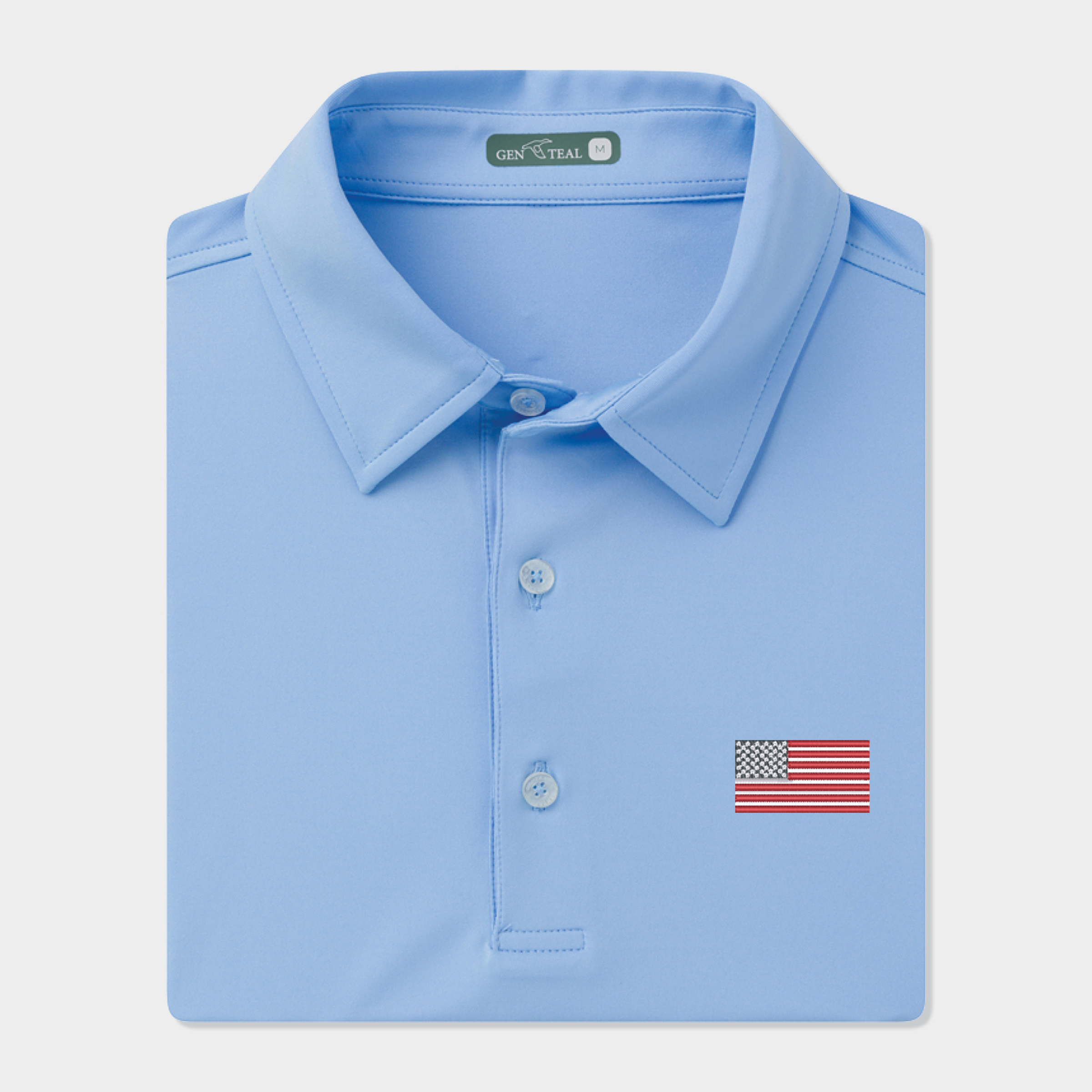 Light blue polo shirt with American flag patch on a light gray background
