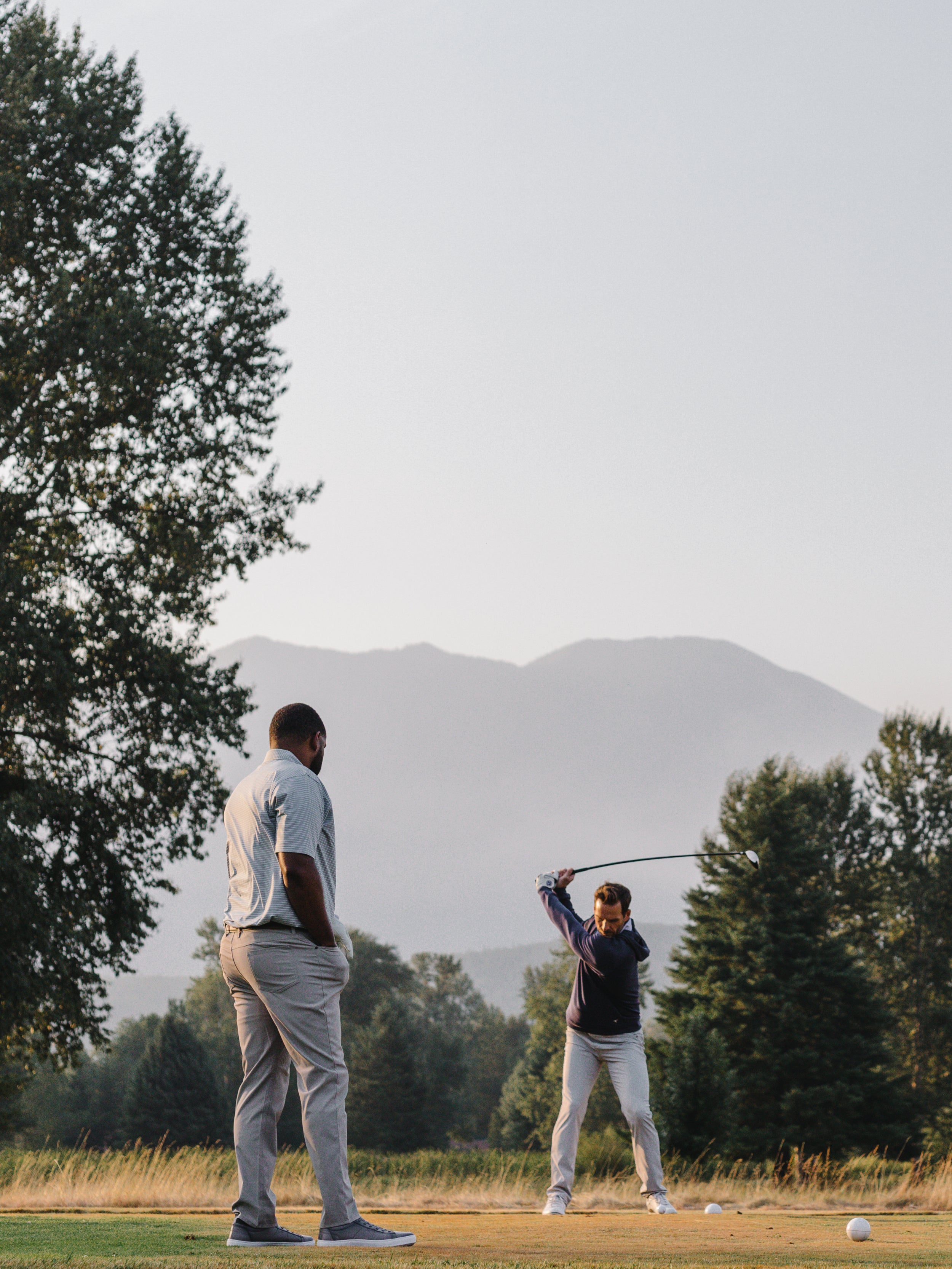 men wearing golf attire by GenTeal Apparel playing a round