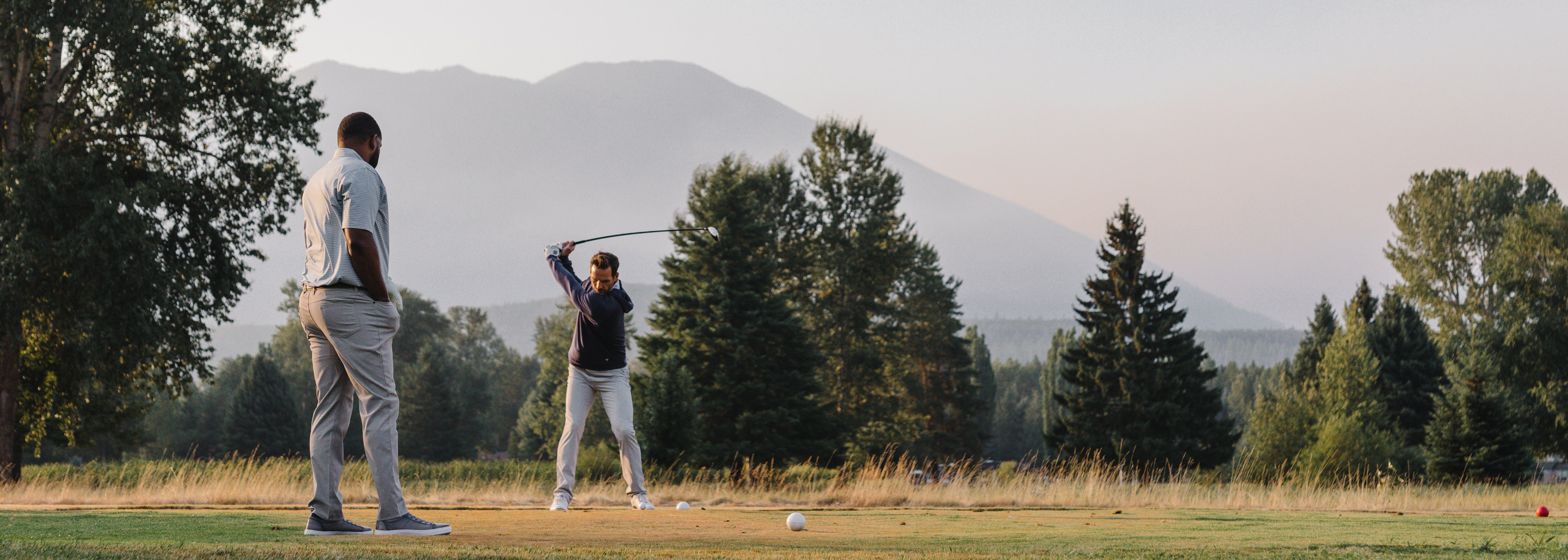 men wearing golf attire by GenTeal Apparel playing a round